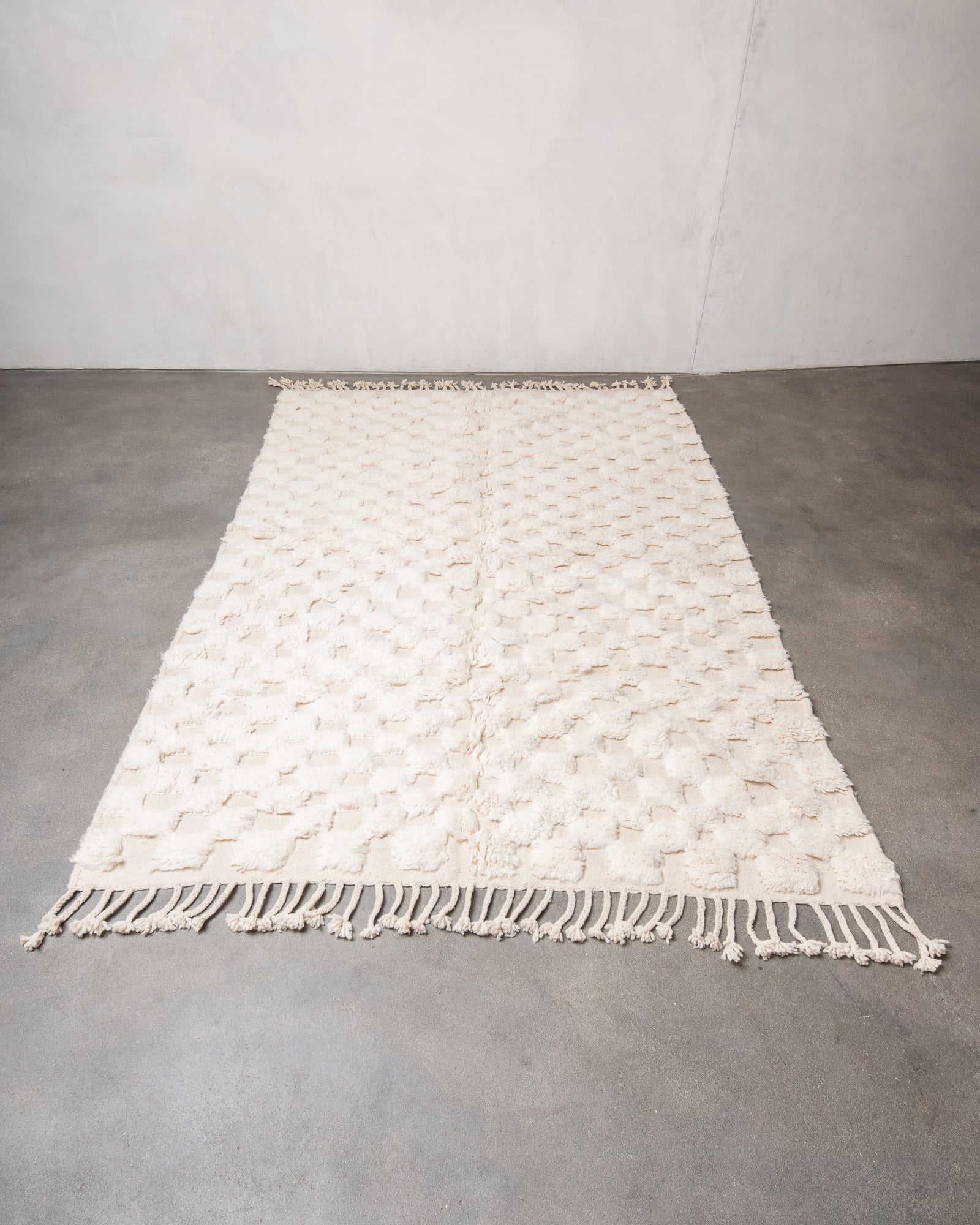Modern, designer, handcrafted Berber rug from Morocco. Beniourain carpet with beautiful colours and patterns and fluffy wool texture.